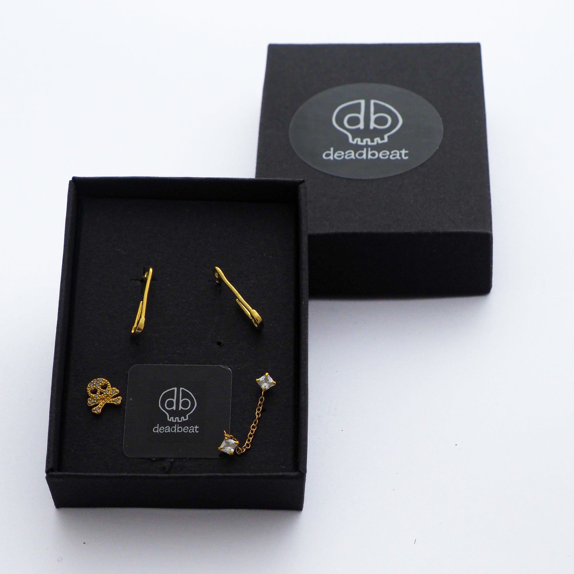 DEADBEAT Rock-Solid 925 Silver 24 ct Gold Plated Safety Pin Ear Stud, Single CZ Skull & Crossbones Ear Stud & Single CZ Double Ear Stud Gift Pack