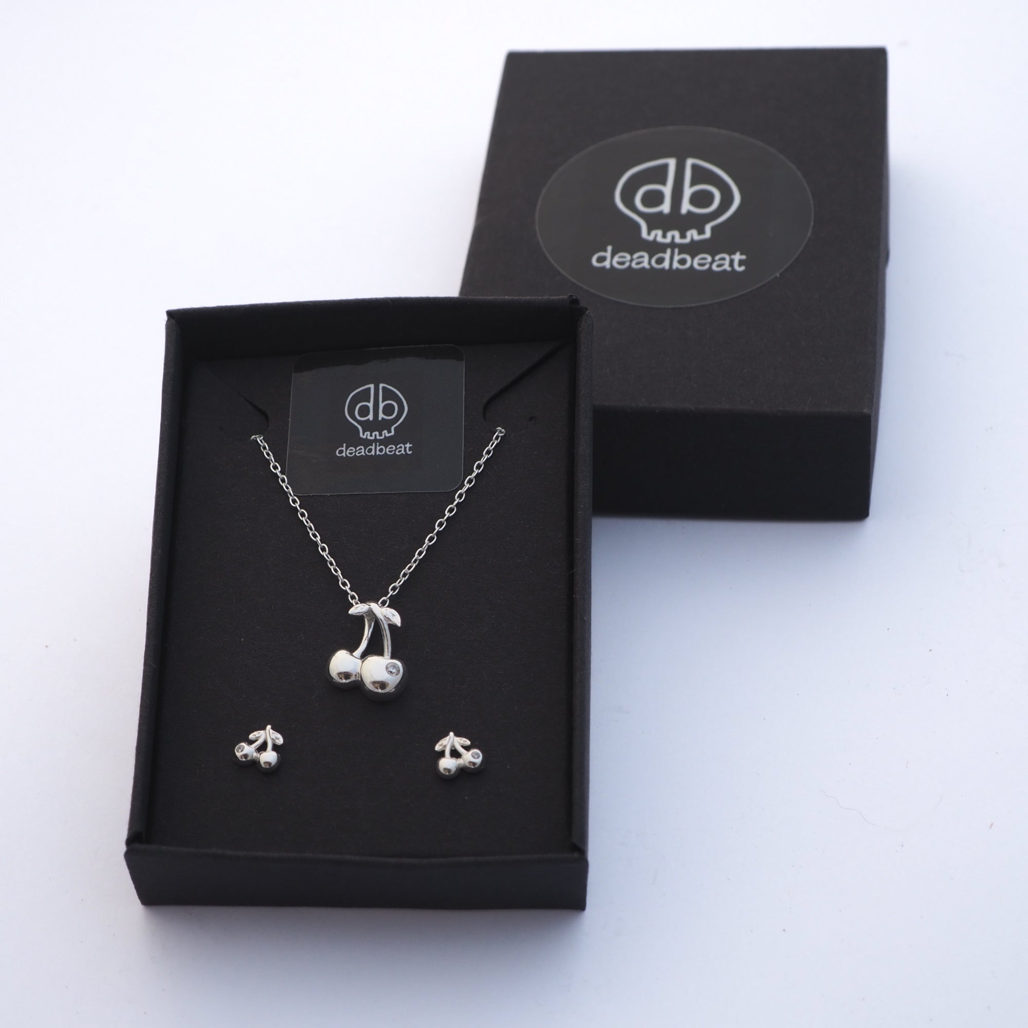 DEADBEAT Rock-Solid 925 Silver Cherry CZ Necklace & Ear Stud Gift Pack
