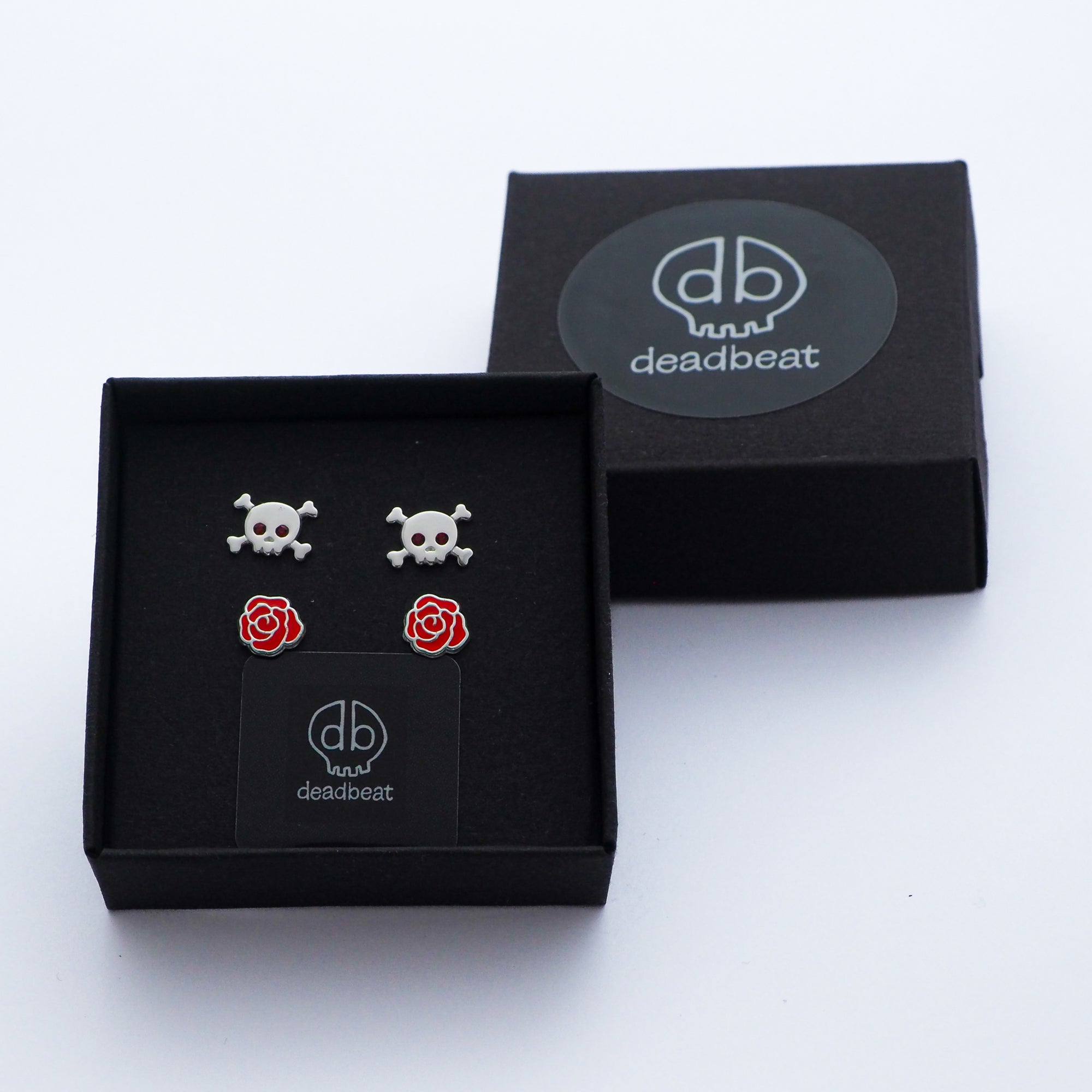 DEADBEAT Rock-Solid 925 Recycled Silver Red Crystal Skull & Crossbones Ear Stud & Tattoo Rose Ear Stud Gift Pack