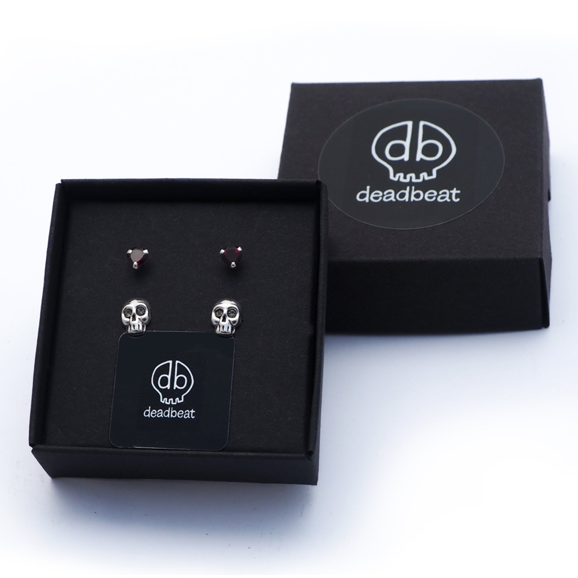 DEADBEAT Rock-Solid 925 Silver Genuine Garnet Heart Ear Stud & Oxidised Crystal Eyed Skull Ear Stud Gift Pack