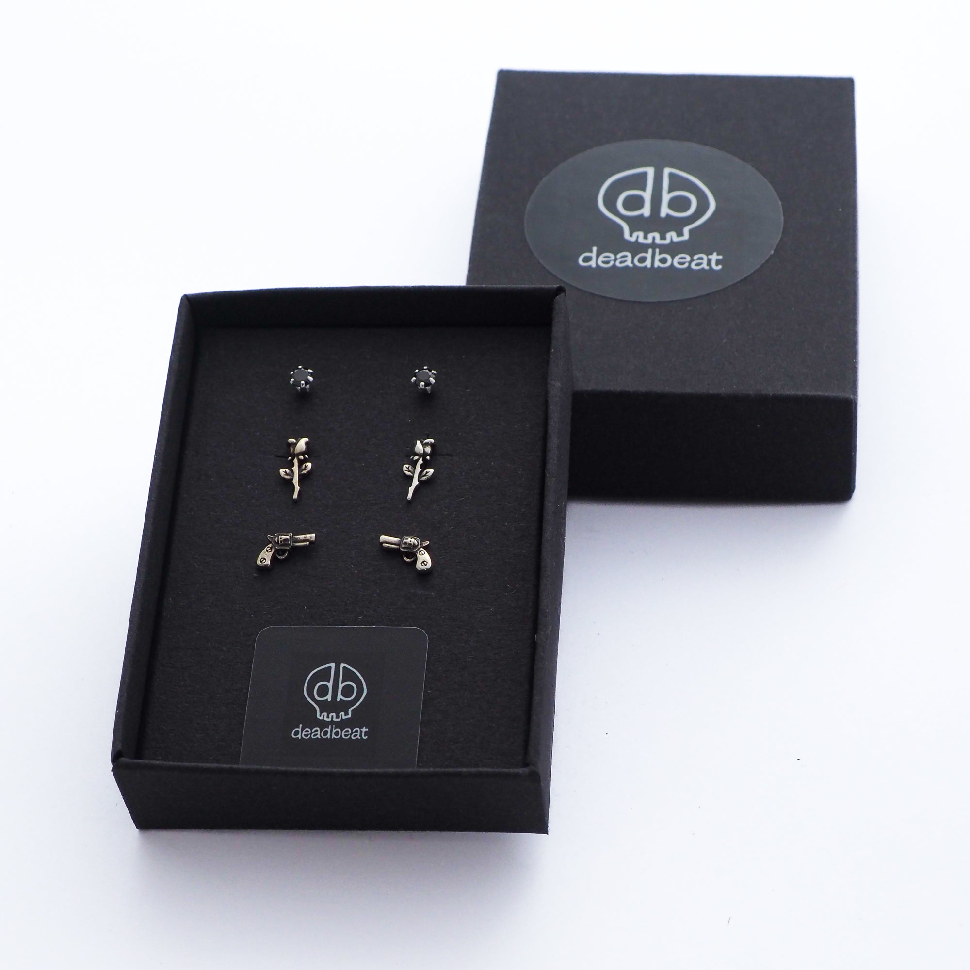 DEADBEAT clou d'oreille en argent 925 solide avec cristal CZ noir, clou d'oreille à tige de rose et clou d'oreille pistolet revolver, coffret cadeau